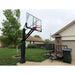 First Team Stainless Olympian Outdoor Front Left Driveway View of Basketball Hoop System In Ground Adjustable Goal