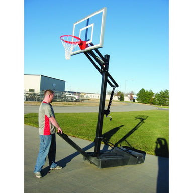 OmniJam First Team Basketball Goal Adjustable Hoop System Portable Goal Transportation lifestyle Image